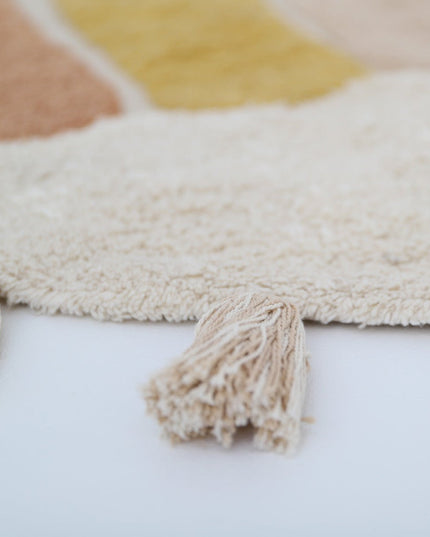 Rainbow Toffee – Wasbaar katoenen vloerkleed voor kinderen met pompons (Ø110 cm, OEKO-TEX)