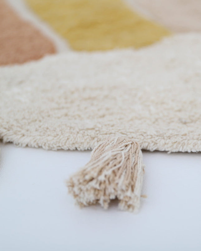Rainbow Toffee – Wasbaar katoenen vloerkleed voor kinderen met pompons (Ø110 cm, OEKO-TEX)