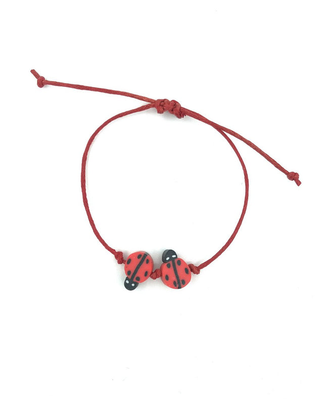 Luna-Leena kinderarmband lieveheersbeestje rood - handgemaakt in Nepal