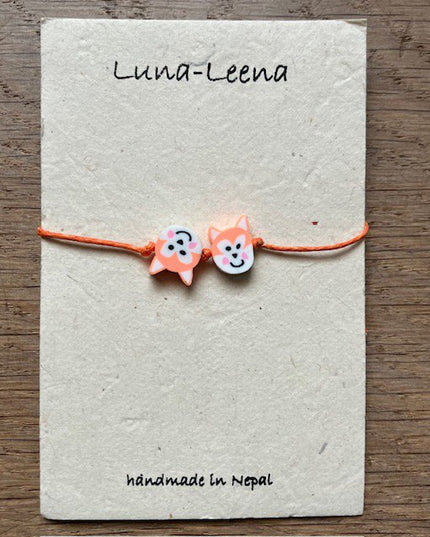 Luna-Leena kinderarmband vos oranje - handgemaakt in Nepal