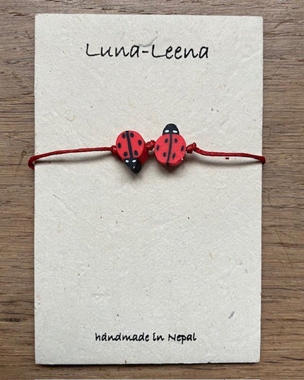 Luna-Leena kinderarmband lieveheersbeestje rood - handgemaakt in Nepal